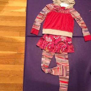 Two piece leggings with attached skirt and top